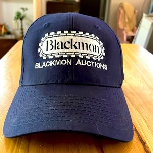 Navy blue cap or lid Blackmon Auctions. The company works with heavy equipment